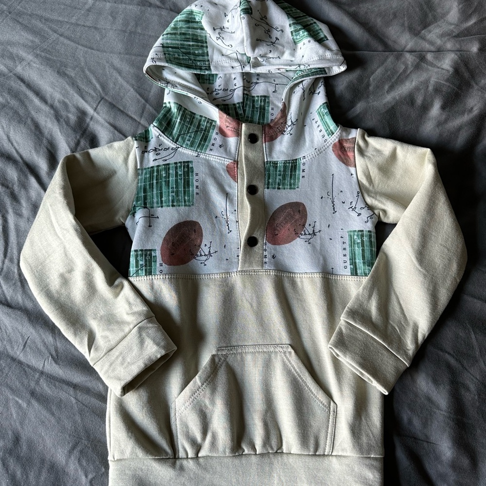 Kids Cream Hooded Pullover Sweatshirt with Green Print